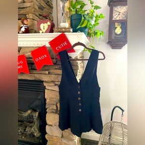 Juniors Romper Black size Medium shorts with 5 brown buttons on the front